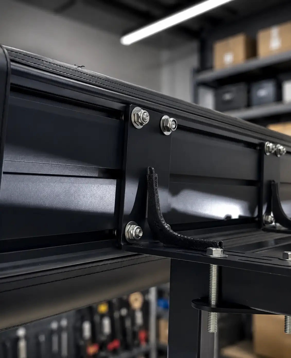 Close-up of the OBK awning mounting rails and reinforced metal brackets, designed for secure installation, strong support, and durable vehicle mounting.